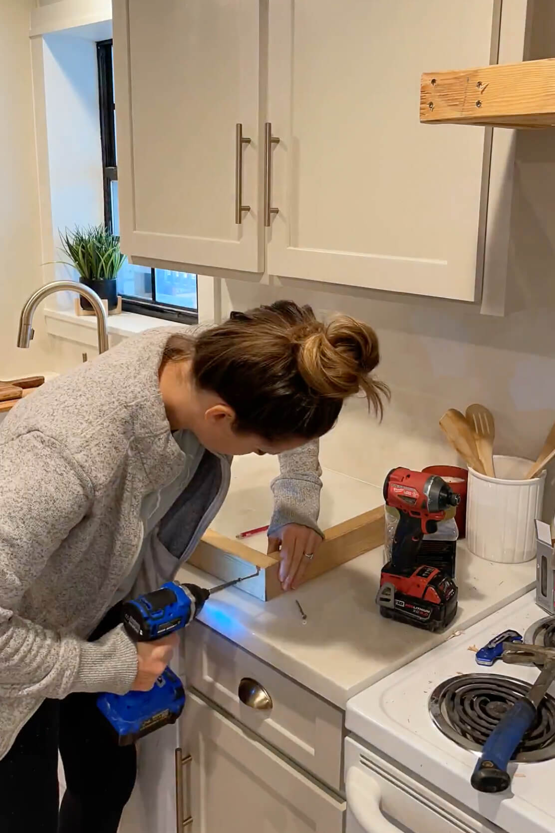 Building the frame of a DIY range hood cover.